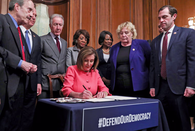 Image: U.S. House Speaker Pelosi holds engrossment ceremony to sign Trump impeachment articles at the U.S. Capitol in Washington