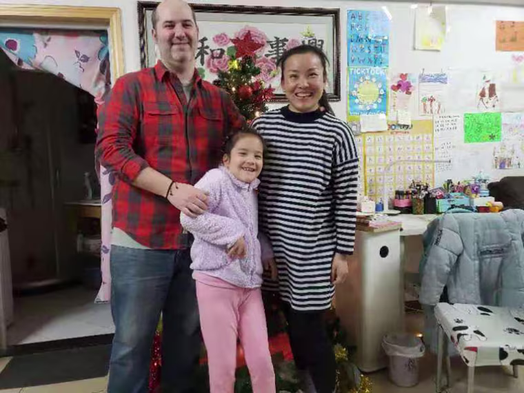 Image: Ben Wilson with his wife and 7-year-old daughter