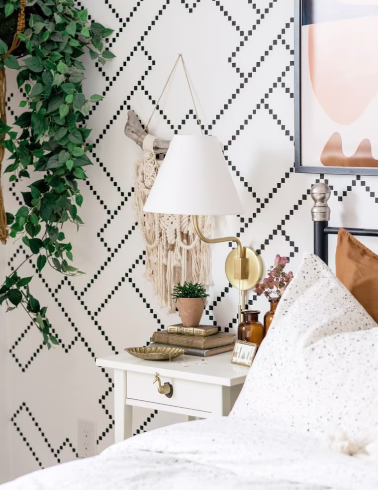 Use plug-in wall sconces, like this Patti Sconce by Mitzi, to flank a bed or accent a living room scene.