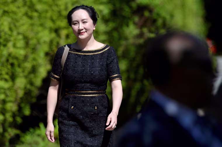 Image: Huawei Technologies Chief Financial Officer Meng Wanzhou leaves her home to attend a court hearing in Vancouver, British Columbia