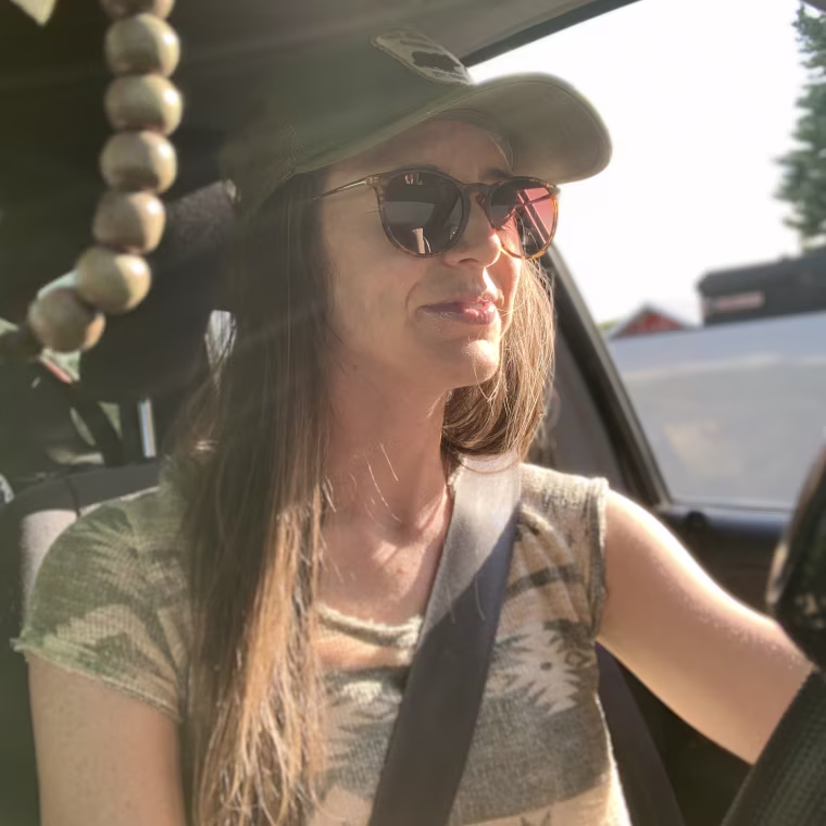 wearing SUNGAIT sunglasses while driving