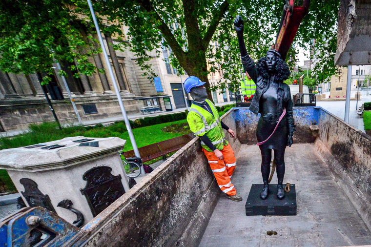 Image: The sculpture "A Surge of Power (Jen Reid) 2020" was removed and will be placed in storage, the mayor said.