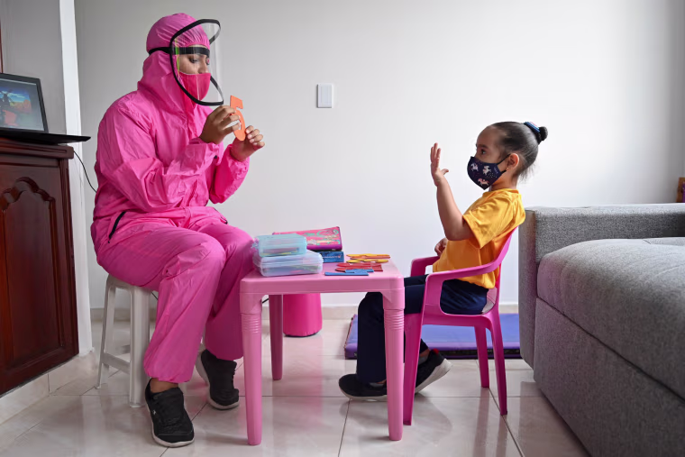 Image: TOPSHOT-COLOMBIA-HEALTH-VIRUS-EDUCATION
