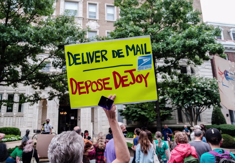 Image: Protest Held Outside Postmaster General Louis DeJoy's DC Home