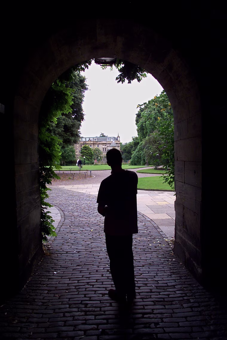 Image: A visitor silhouetted