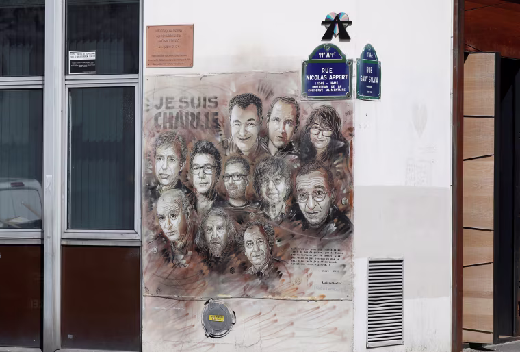 Image: Artwork in tribute to members of satirical magazine Charlie Hebdo
