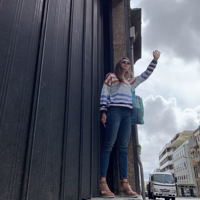 hailing a cab in my KIRUNDO striped sweater