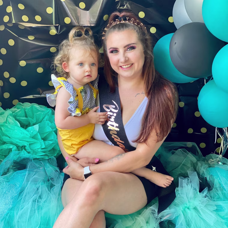 Alex Cruff, 26, pictured here with her two-year-old daughter