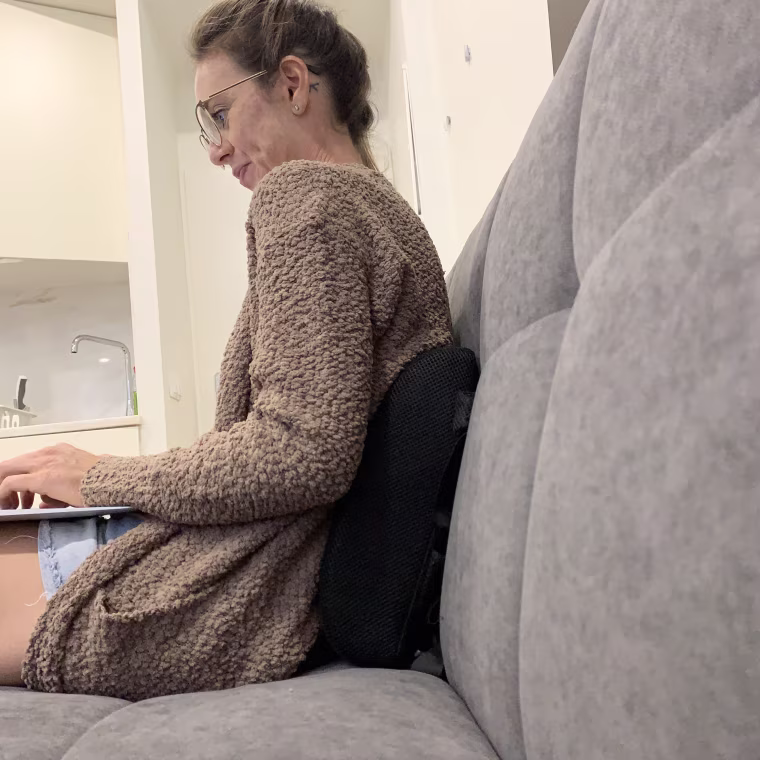 using my Everlasting Comfort lumbar support cushion on my hard-as-rock futon
