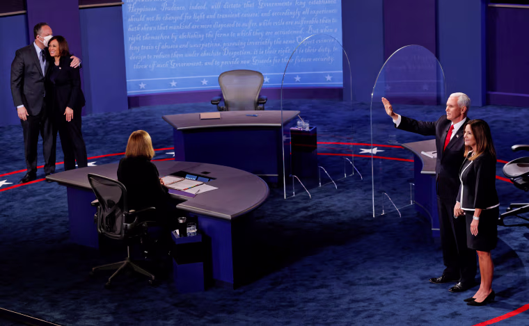 Image: Democratic vice presidential nominee Senator Kamala Harris and U.S. Vice President Mike Pence participate in their 2020 vice presidential campaign debate in Salt Lake City