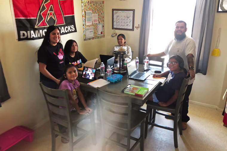 The Brooks family in their home in the Gila River Indian Community.