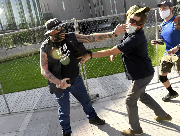 Dualing rallies in Denver leaves one dead