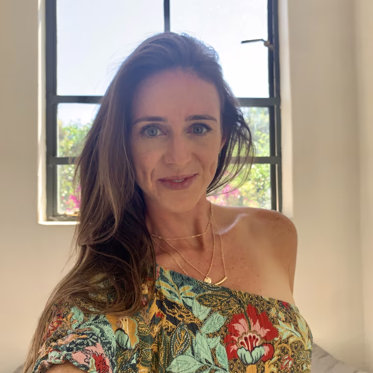 wearing all three necklaces together at Latitude 15, a luxury boutique hotel in Lusaka
