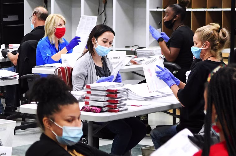 IMAGE: Election workers in Orlando