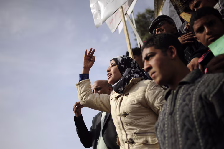 Image: Demonstrators shout slogans as they protest in Sidi Bouzid, Tunisia, in January, 2011 — a month after Mohammed Bouazizi set himself alight.