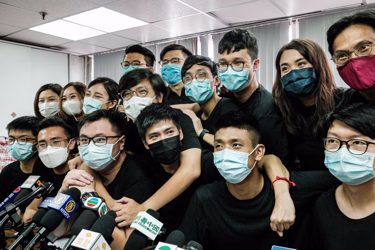Image: Winners of the unofficial democratic primaries pose at the end of a press conference in Hong Kong on July 15, 2020.
