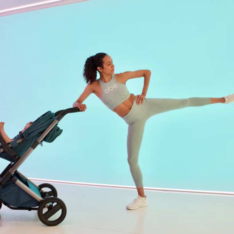 Obe Instructor working out with stroller and baby