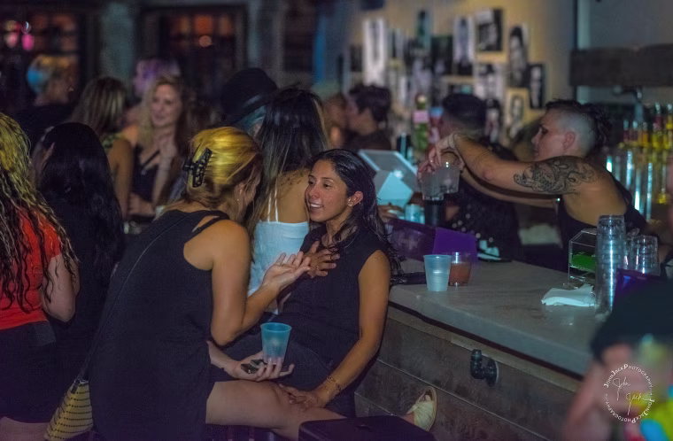 Image: Opening night at A League of Her Own bar, "ALOHO," in Washington
