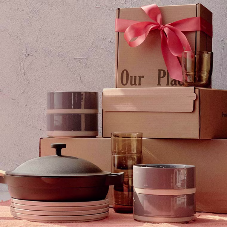 Our Place gift set with a pan, plates and cups