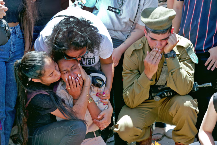 Mourners attend the funeral of Israeli soldier Omer Tabib, 21, in Elyakim, northern Israel, on May 13. Tabib was killed when Palestinian militants in Gaza fired an anti-tank missile near the border, the army said, amid tit-for-tat rocket fire and airstrik