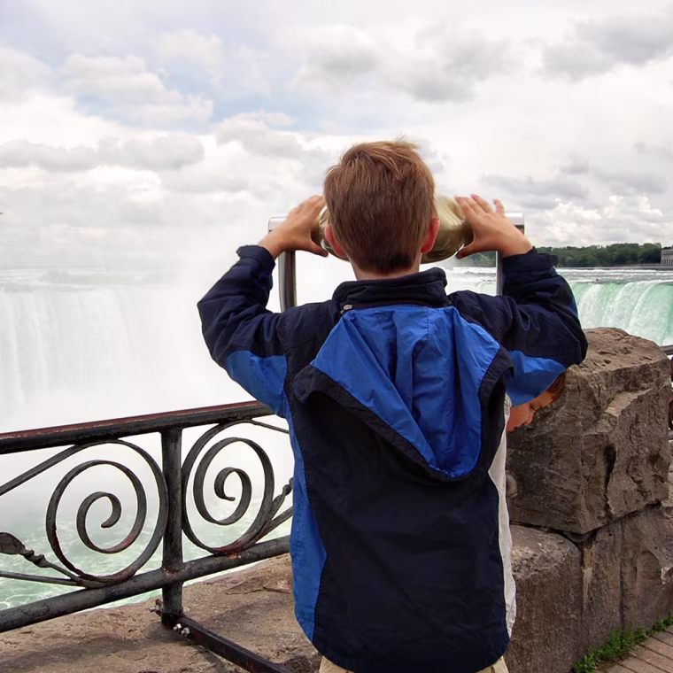 Child looking at Niagra Falls