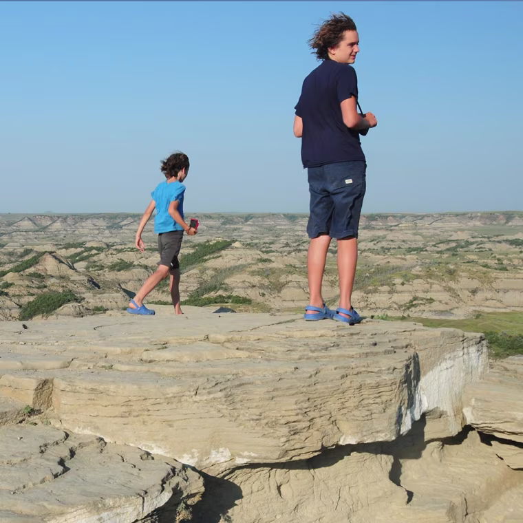 Father and Son looking out at the Theodore Roosevelt National Park