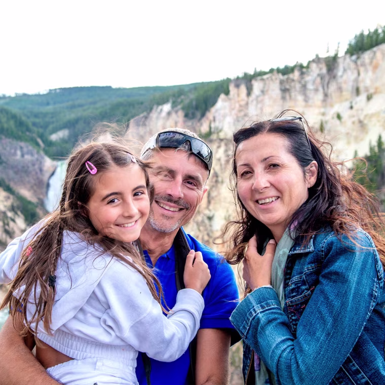 Family Smiling at Yellowstone National Park