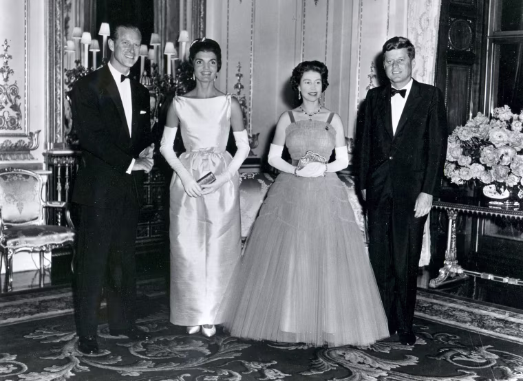 President John F. Kennedy and his wife, first lady Jacqueline Kennedy, with Queen Elizabeth II and her husband, Prince Philip, Duke of Edinburgh, attend a banquet at Buckingham Palace in London, United Kingdom, June 15, 1961.