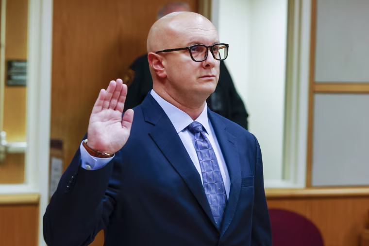 William Braddock raises his hand to take an oath during a hearing on June 22, 2021, in Clearwater, Fla.