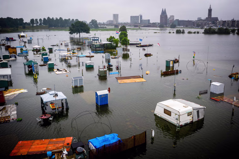 Partially submerged caravans and campers at the camping site of De Hatenboer in Roermond on July 15, 2021.