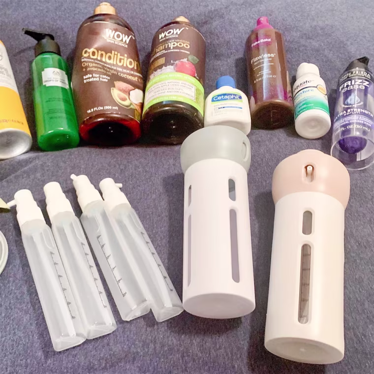 Image of products laying on a bed and a 4-1 travel container