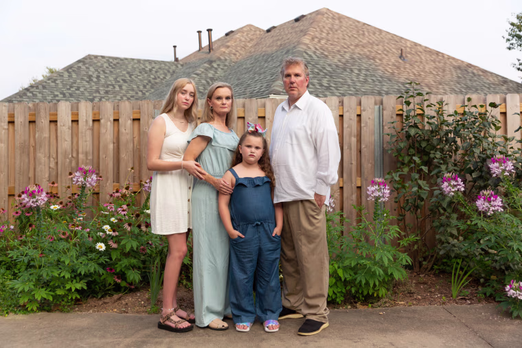 Jennifer and Lorne Carter with their daughters, Lucy and Natalie.