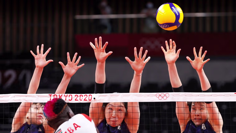 Kenya's Sharon Kiprono goes up against Japan's volleyball team at the Tokyo Games on July 25, 2021.
