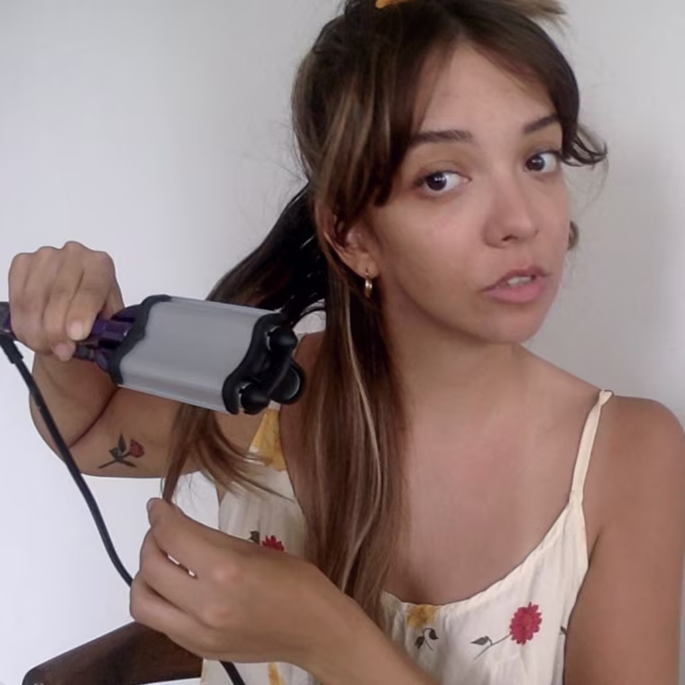 Writer Cailey Rizzo using the Bed Head Wave Artist Hair Waver on her hair