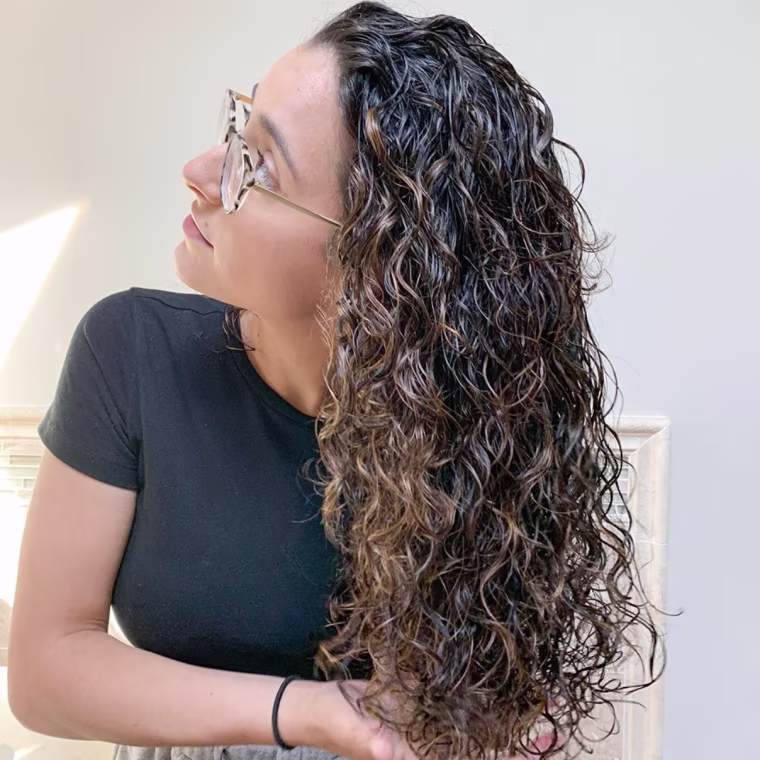 Scrunching my hair helps to make sure the product is thoroughly applied and reinforces the curls.