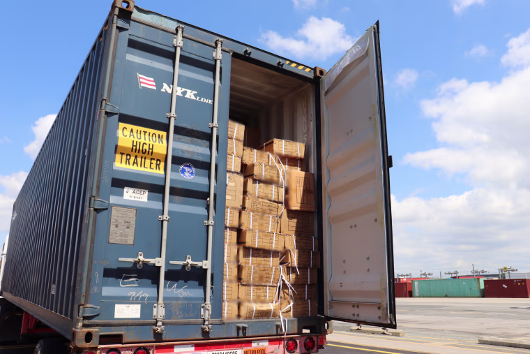 Officers of Customs and Border Protection inspect a shipment of hair pieces and accessories from China suspected to have been made with forced labor in June 2020 at the port of New York/Newark.