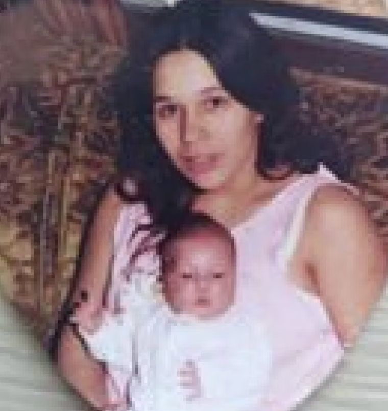 Susan Poupart holding daughter, Alex Poupart