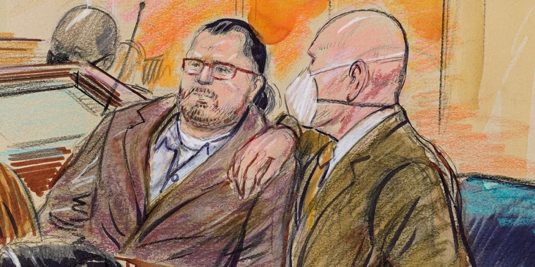 Image: Courtroom sketch of Guy Wesley Reffitt with his lawyer William Welch.