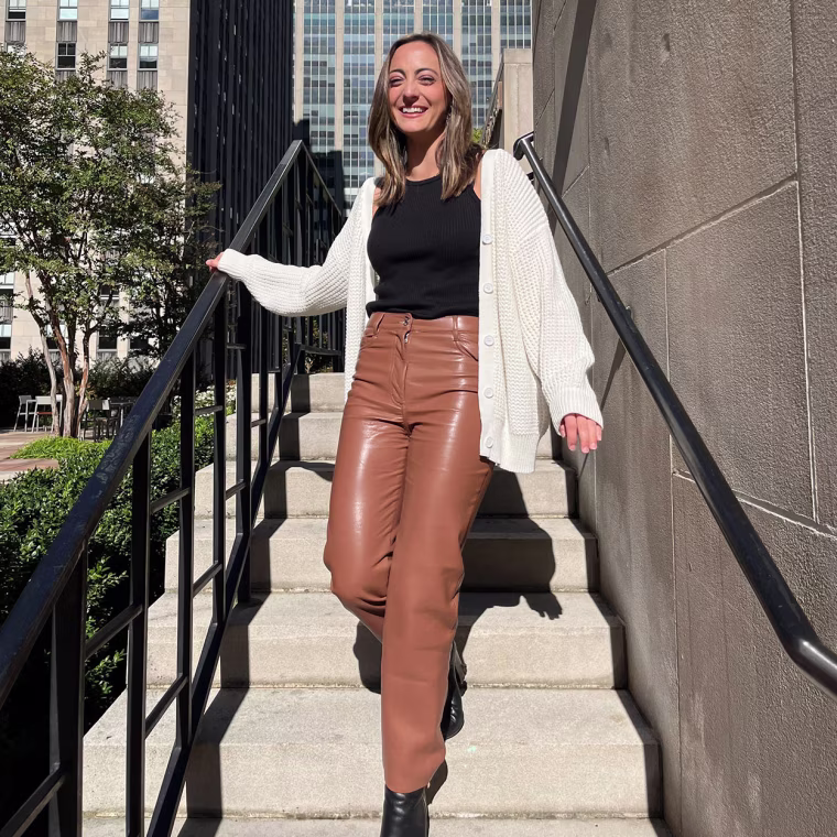 Writer wearing leather pants