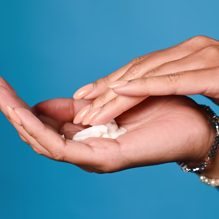 Hand with lotion in it