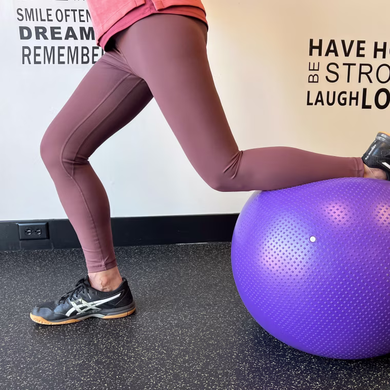 Woman wearing stylish pink leggings