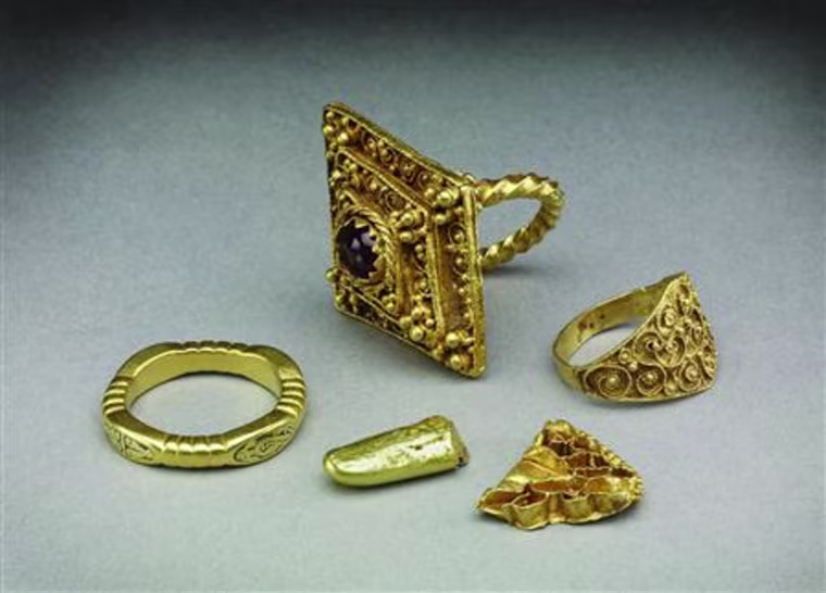 Early medieval gold objects including rings found in West Yorkshire, northern England in 2008 are seen in an undated photo
