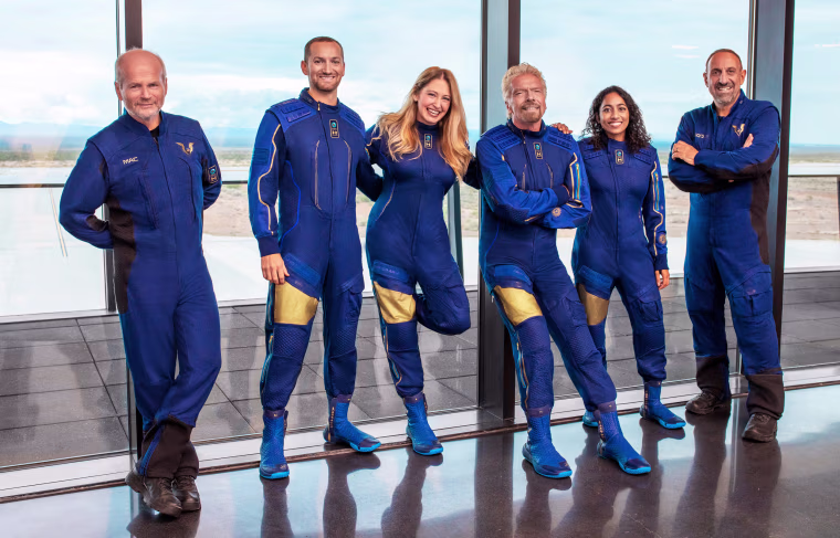 Virgin Galactic Unity22 Crew Dave Mackay, Chief Pilot; Colin Bennett, Lead Operations Engineer; Beth Moses, Chief Astronaut Instructor; Richard Branson, Founder Virgin Galactic; Sirisha Bandla, Vice President of Government Affairs and Research Operations; and Michael Masucci, Pilot.