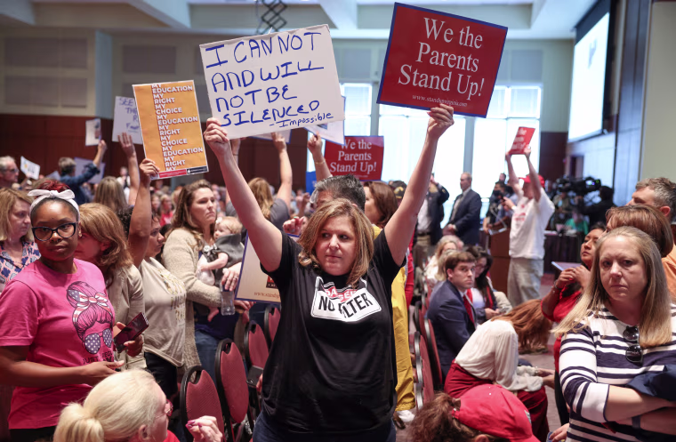 Image: A Virginia School board meeting reflects a battle playing out across the country over a once-obscure academic doctrine known as Critical Race Theory, in Ashburn