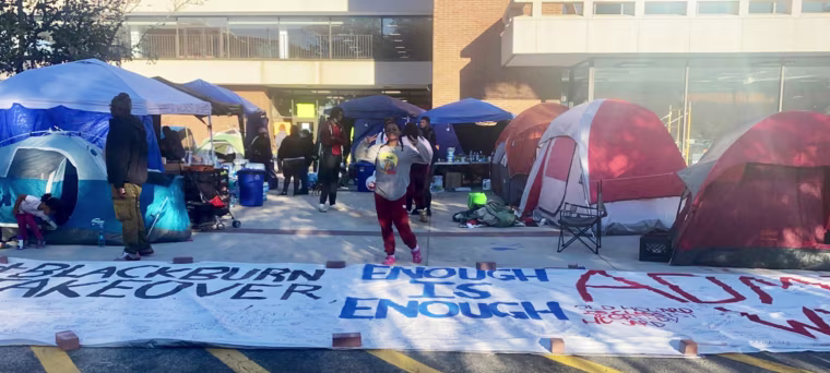 Image: Kymora Olmo near the tents at Howard University.