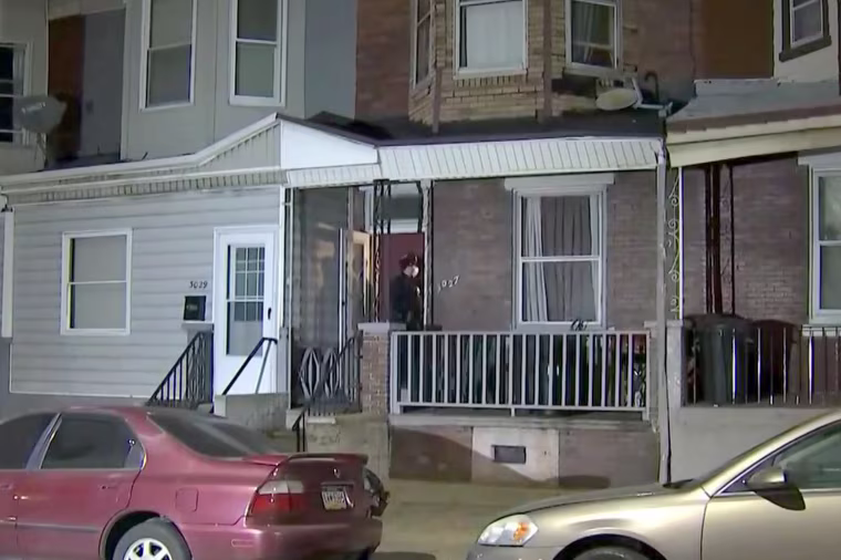 Officers at the scene in the Kensington neighborhood of Philadelphia on Friday.