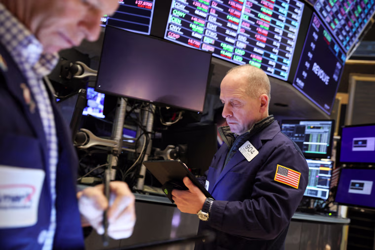 Image: Traders work on the floor of the New York Stock Exchange on Feb. 18, 2022.