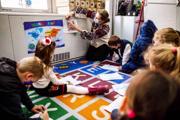 Yaryna Glum teaches kindergarten students about Ukrainian geography at Self-Reliance School of Ukrainian Studies in New York on Feb. 26, 2022.