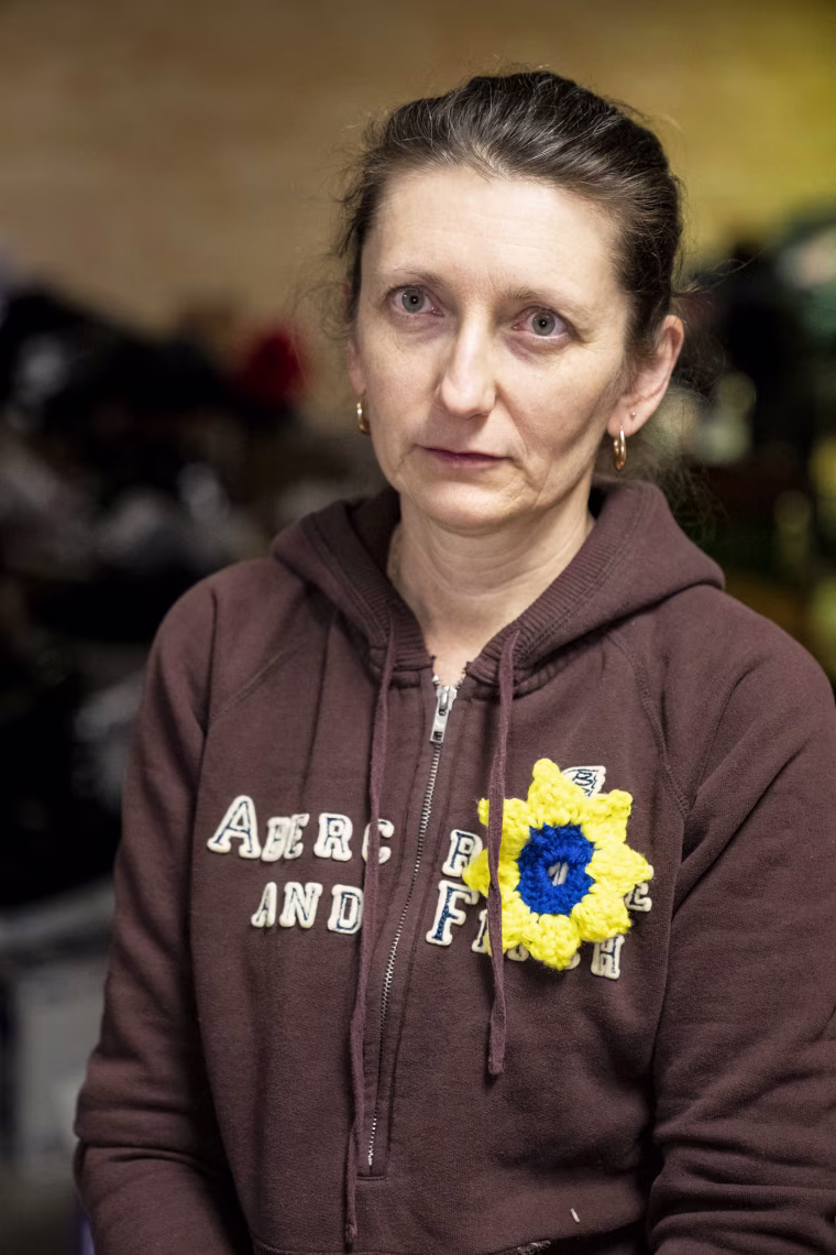 Alona Vakal stands for a portrait as members of the community help organize and load a truck with medical and relief items to be sent to Ukraine at St. Matthew Orthodox Church on March 10, 2022 in Green Bay, Wisc.