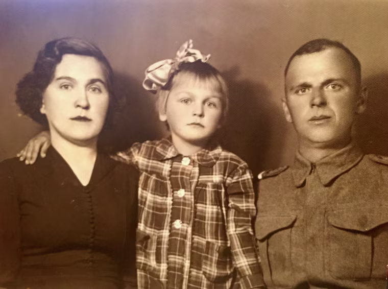Marie Soltys with her parents after her deportation from Ukraine.